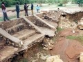 Eroded dam structure