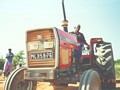 Women on tractor in Africa