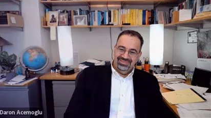 Daron Acemoglu in his office